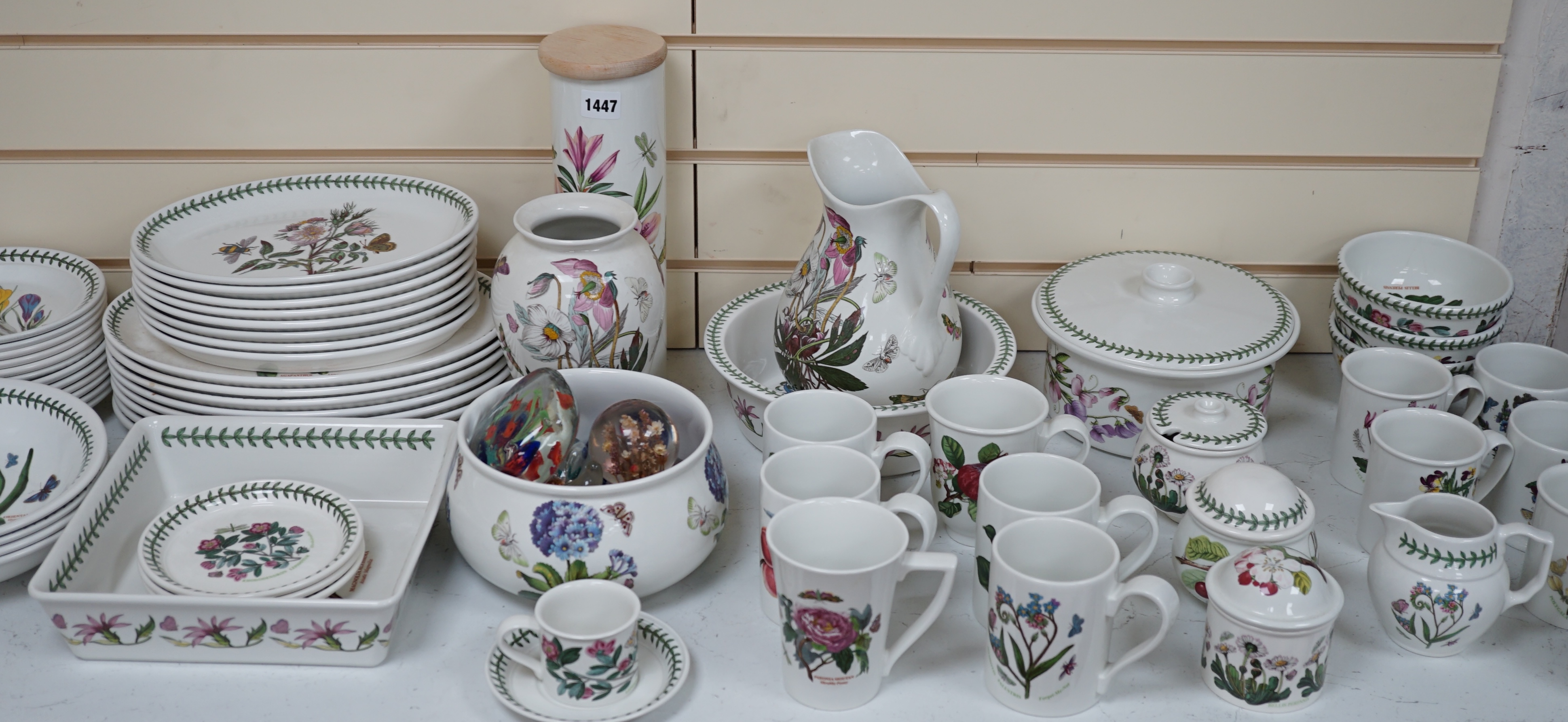 A large quantity of Portmeirion 'Botanic Gardens' tea, dinner and kitchen wares, together with cutlery and seven glass paperweights
